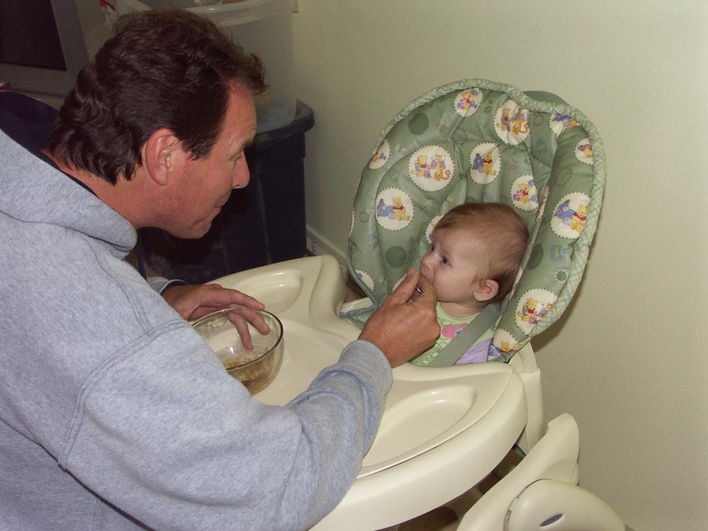 Grandpa Davidson gives Callie her second feeding of 