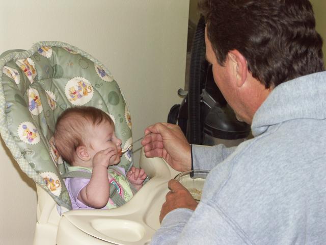 Grandpa Davidson gives Callie her second feeding of 