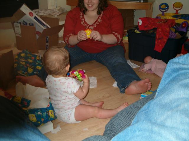 Callie opens her presents (with mommie's help)