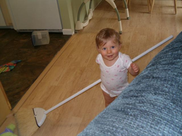Callie sweeps the floor