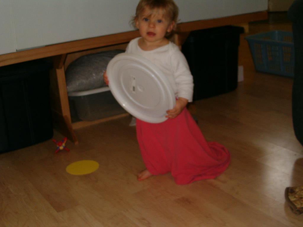 with her accessory, the tambourine.