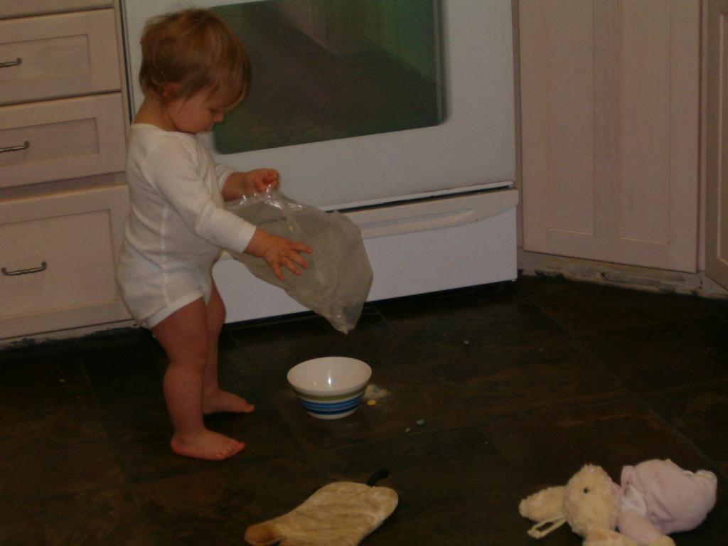 Callie attempts to pour herself a bowl of cereal...
